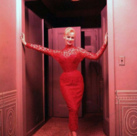 Sabrina (Norma Sykes) in a doorway