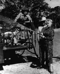 Sabrina waters the Melton Dam 1963