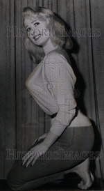 Sabrina kneeling